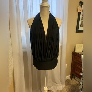 Body suit. No tags but I never wore it. Just don’t have the boobs for it.